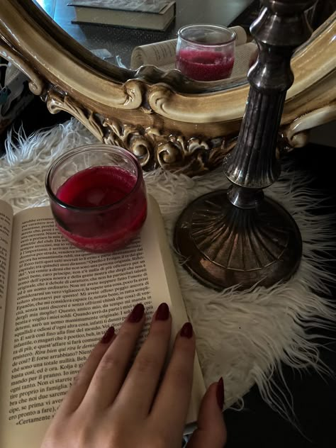 red nails, books, candles, vintage mirror, Red Lady Aesthetic, Arushicore Aesthetic, Camila The Secret History Aesthetic, Couqutte Aesthetic Dark, Russian Red Aesthetic, Red Nails Aesthetic Vintage, Dark Academia Lipstick, Lady Dakota Warren Aesthetic, Dark Red Coquette Aesthetic