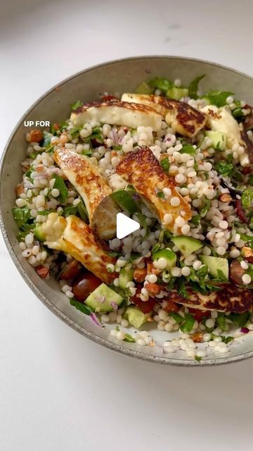 Sarah Pound on Instagram: "PAN-FRIED HALLOUMI, CHERRY TOMATO & PEARL COUS COUS SALAD 

Serves 4
 
Ingredients:
1.5 cups pearl couscous
2 lebanese cucumbers, chopped
2 cups cherry tomatoes, quartered
½ red onion, finely chopped
1 cup parsley, finely chopped
1 cup mint, roughly chopped 
1/2 cup toasted almonds, roughly chopped
180g halloumi cheese, cut into strips
1 tablespoon extra virgin olive oil

Dressing:
1 tablespoon extra virgin olive oil
1 teaspoon Dijon mustard
1 tablespoon apple cider vinegar
2 teaspoons pure maple syrup
1 lemon, juiced

Extra lemon for serving.

Method:

1. Spread almonds onto a baking tray and place in the oven for the last 15 minutes. Cool and roughly chop.

2. Fill a medium saucepan with salted water and bring to the boil. Add pearl couscous and reduce to a sim Pearl Cous Cous Salad, Halloumi Tomato Salad, Quinoa And Halloumi Salad, Pearl Cous Cous Salad Roasted Vegetables, Herby Couscous With Halloumi, Haloumi Recipes, Pearl Couscous Salad, Pearl Couscous, Couscous Salad Recipes