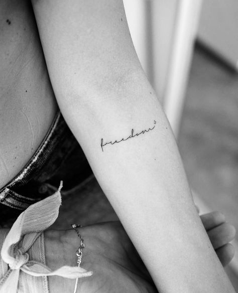 Small Tattoos Freedom, Small Freedom Tattoos For Women, Freedom Small Tattoo, Tattoo Freedom Ideas, Cursive Small Tattoo, Tattoo Means Freedom, Tattoos About Freedom, Kindness Tattoo Ideas, Freedom Tattoo Ideas