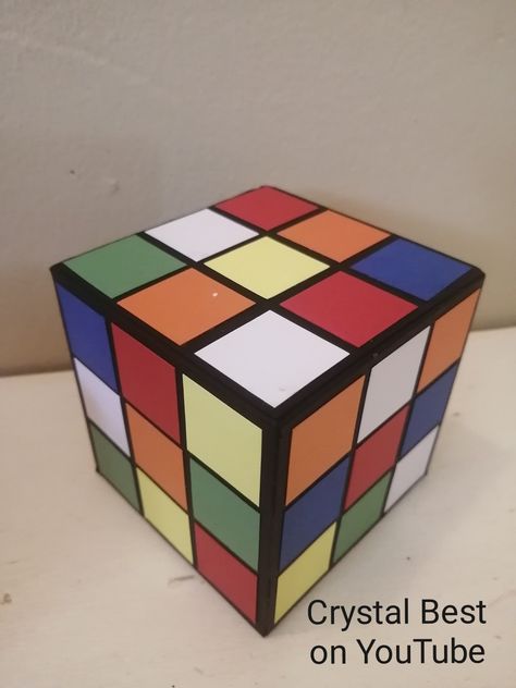 DIY Rubik's Cube Box Tutorial How To Make A Rubiks Cube, Diy Rubix Cube, Diy Rubix Cube Boxes, Rubix Cube Valentine Box Ideas, Rubix Cube Party Decorations, Diy Rubiks Cube Decor, Rubix Cube Decoration, How To Make A Giant Rubix Cube, Diy Rubics Cube Decor