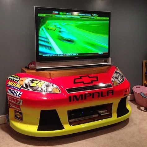 man cave ideas | NASCAR tv stand/ maybe a Cadillac grille or something. F1 Man Cave, Nascar Man Cave Ideas, Nascar Room, Racing Room, Man Cave Ideas, Car Desk, Old Car Parts, Car Part Furniture, Automotive Furniture