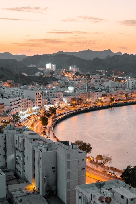 city skyline during night time photo – Free Image on Unsplash Muscat City, Oman Tourism, Popular Travel Destinations, Best Pubs, Pyramids Of Giza, The Tourist, Muscat, Lost City, Countries Around The World