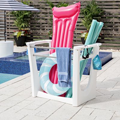 The Vero Poolside Deck Box is built to effortlessly blend aesthetics and functionality. Neutral colors and clean lines combine to store pool toys, floats, noodles, and more to clean up your space while upgrading your style. With this outdoor pool storage system, you can hang towels or clothing on the 304 stainless steel bars and goggles and dive rings on the side notches to keep everything neatly together. The large, open design makes it easy to add and remove items while promoting airflow to al Pool Toys Storage Ideas, Pool Raft Storage Ideas, Pool Organization Ideas, Pool Toy Storage Ideas, Outdoor Pool Storage, Pool Side Decorating Ideas, Pool Towel Storage Ideas, Pool Float Storage Ideas, Pool House Storage