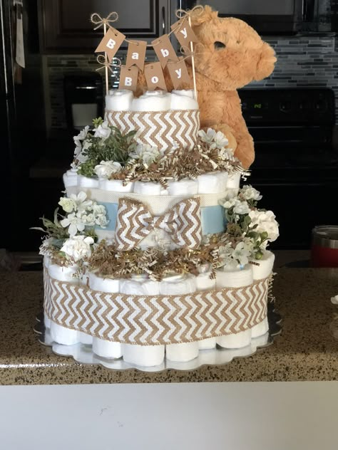 Diaper Cake Ideas For Boys, Baby Boy Diaper Cake Ideas, Unique Diaper Cakes For Boys, Baby Boy Diaper Cake Ideas Diy, Boy Diaper Cake Ideas, Neutral Diaper Cake Ideas, Dipper Cakes Diy, Creative Diaper Cakes, Diaper Cakes For Baby Boy