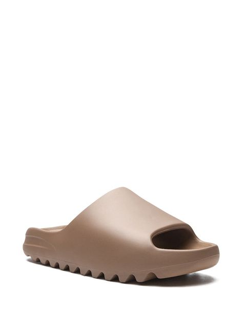 Find YEEZY Yeezy Slide Core 2021 Sneakers on Editorialist. brown rubber open toe slip-on style branded insole rubber sole These styles are supplied by a premium sneaker marketplace. Stocking only the most sought-after footwear, they source and curate some of the most hard to find sneakers from around the world. Yeezy Slides, Brown Sneakers, Dolce & Gabbana, Kanye West, Heeled Mules, Mule Shoe, Open Toe, Balenciaga, Kitten Heels