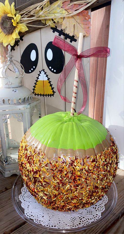 Carmel Apple Painted Pumpkin, Food Theme Pumpkin Decorating, Carnival Pumpkin Decorating, Caramel Apple Pumpkin Painting, Christmas Themed Pumpkins, Candyland Pumpkin Decorating, Candy Apple Pumpkin Decorating, Pumpkin Inspo, Pumpkins Painting