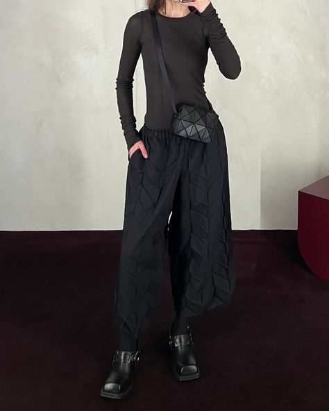 The Me Issey Miyake black Zig-Zag pleats pants, styled with the Rick Owens dark dust classic rib long sleeve, the Bao Bao Cuboid shoulder bag and the Acne Studios leather buckle mule. ⁠ ⁠ New Arrivals from Me Issey Miyake are available in-store now and will be online soon. Baobao Bag Issey Miyake Outfit, Pleats Pants, Issey Miyake Pants, Issey Miyake Turtleneck, Issey Miyake Pleats Please Street Style, Issey Miyake Pleats Please Pants, The Rick, Bao Bao, Leather Buckle