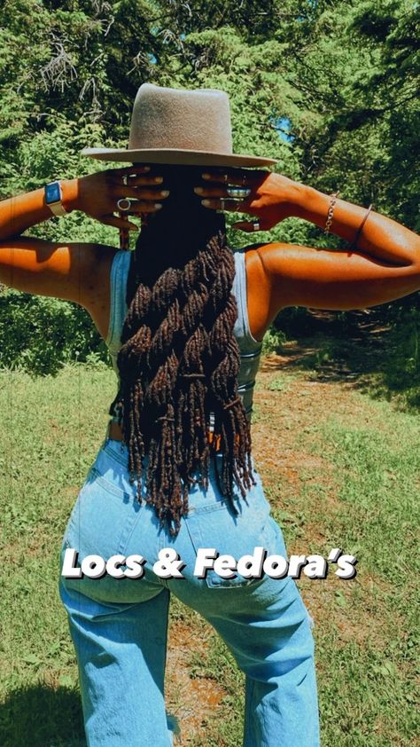 Locs•Fashion•SAHM life on Instagram: "Locs and Fedora’s 😍 I love a good hat and loc look. Absolutely adore fedora’s and this one by GigiPip doesn’t disappoint. ✨Hat link in my bio . . . . . . . . #hats #locstyles #locs #locstylesforwomen #locstyle #loccommunity #locjourney #locdhaircommunity #locsandmelanin #locblogger #loccrush #locbae #locgoddess #locgoals #locgrowth #naturalhair #locs_18 #locnation #gigipip" Locs With Fedora Hat, Fedora With Locs, Hats For Dreadlocks, Locs And Fedoras, Hat Over Locs, Hats Over Locs, Loc Styles With Hats, Locs With Hats Women, Hats With Locs