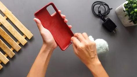 3 Ways to Clean a Phone Case - wikiHow Clean Your Phone, Clear Phone Case, Stain Remover, Cell Phone Cases, Baking Soda, Cell Phone, Phone Case, Soap, Phone Cases