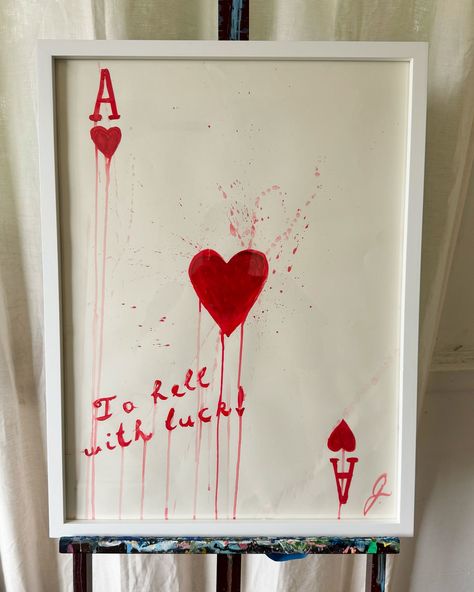 *Frame NOT included. 18x24 inches, acrylic paint on paper. Here’s your chance to own a original art piece by artist Jesse Black! Decorate your home with this statement piece “To hell with luck! (Ace of hearts).” More about this piece: The overall aesthetic, with its bold red splashes and dripping paint, evokes a sense of intensity and passion. The use of the Ace of Hearts, traditionally a symbol of love and luck, juxtaposed with the phrase “To hell with luck!” suggests a narrative that c... Painting On Cards Deck, Red Heart Painting Aesthetic, Ace Of Hearts Painting, Feeling Lucky Painting, Red And Black Paintings Simple, Ace Of Hearts Wall Art, Inkbox Tattoo, Ace Of Hearts, Acrylic Painting On Paper