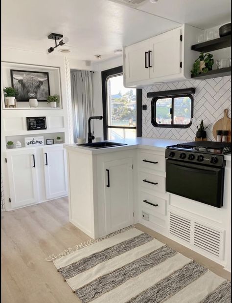 Camper White Interior, Modern Farmhouse Rv Decor, Farmhouse Style Camper, Gray And White Camper Interior, Camper Renovation Kitchen, Vintage Winnebago Remodel, Black And White Camper Decor, Modern Caravan Interior Ideas, Rvs And Campers