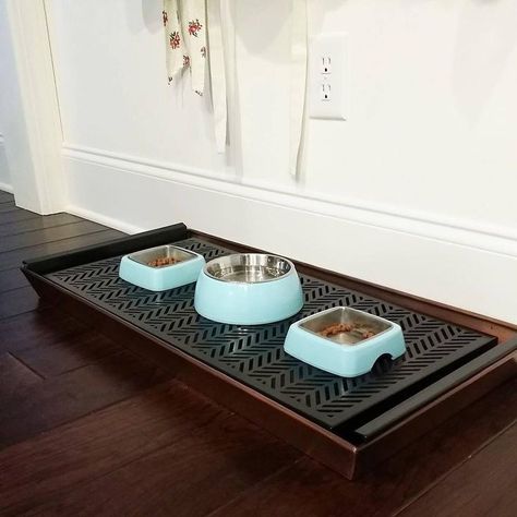 Have problems keeping your pet feeding area clean? If so,try using a boot tray! I use this for my 2 cats & have no issues with food or water spilling all over the floor anymore. The extra food falls between and I clean it out once a week. No more messes! (Tray is from Target) Cat Feeding Area, Dog Food Area, Pet Food Area, Food Tray Diy, Food Area, Healthy Cat Food, Pet Feeding Area, Cat Area, Dog Feeding Station