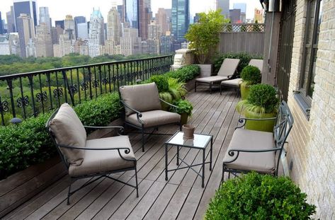 Wood flooring gives the feel of an outdoor room on a balcony Balcon Mic, Design Per Patio, Serenity Garden, Boxwood Garden, Terrasse Design, New York Penthouse, Modern Balcony, Small Balcony Garden, Balcony Furniture