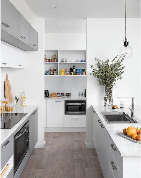 We're loving the seamless flow between the butler's pantry and kitchen in this design! The layout of your space should be carefully considered if you want to achieve a consistent look and feel - for the most successful result, it's wise to use the same colour palette and door profiles throughout each space! . . . #kaboodle #kaboodlekitchen #interiorsinspo #kitchendesign #designideas #kitchenlayout #smokedgrey #nougattruffle Open Galley Kitchen, Kaboodle Kitchen, Pantry Redo, Rustic Country Kitchens, Butlers Pantry, Kitchen Solutions, Studio Kitchen, Galley Kitchen, House Design Kitchen