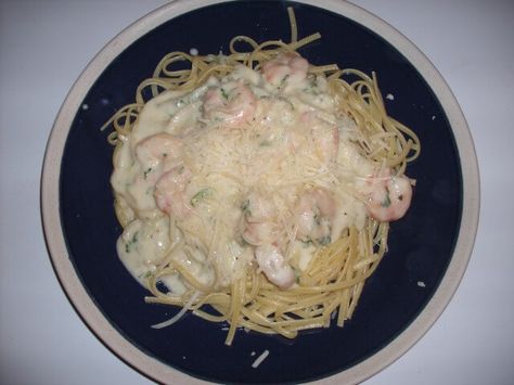 A recipe for Red Lobster's Shrimp Pasta made with olive oil, garlic, shrimp, clam juice or chicken broth, white wine, heavy cream, Parmesan Red Lobster Shrimp Pasta Recipe, Lobster Shrimp Pasta, Shrimp Linguine Alfredo, Stir Fry Dinner Recipes, Red Lobster Shrimp, Pasta With Olives, Alfredo Sauce Recipe Easy, Shrimp Linguine, Pesto Shrimp