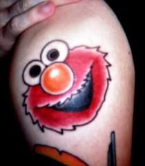 elmo Elmo Tattoo, Elm Street Tattoo, Horrible Tattoos, Pictures Of Tattoos, Whimsical Tattoos, Tribute Tattoos, Elmo Sesame Street, Street Tattoo, Own Tattoo