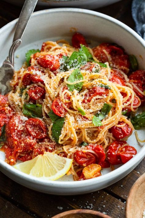 If you're looking to add to your options for weeknight dinners, try this easy angel hair pasta recipe! It is loaded with cherry tomatoes bursting with flavor, fresh basil leaves and garlic all topped with parmesan cheese. It's simple and on the table in less than 30 minutes! #angelhairpasta #easydinner #pastarecipe Angel Hair Recipes, Angel Hair Pasta Recipe, Cream Of Mushroom Pasta, Angel Hair Pasta Recipes, Pasta Recipes Video, Oh Sweet Basil, Tomato Basil Pasta, Cherry Tomato Pasta, Butter Pasta