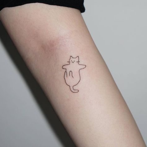 Top 61 Best Simple Cat Tattoo Ideas - [2021 Inspiration Guide] Cat Tattoo Simple Funny, Small Clean Tattoos, Cat Belly Tattoo, Orange Cat Tattoo Simple, Minimalist Tattoo Ideas Creative, Little Cat Tattoo, Tattoo Ideas Cat, Cute Cat Tattoos, Minimalist Cat Tattoo Designs