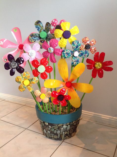 Recycled plastic bottle flowers. In Stone pot made by Mum with West Coast (New Zealand) stones. West Bottle Craft, Bottle Flowers, Plastic Bottle Flowers, Bottle Craft, Plastic Bottle, Recycle Plastic Bottles, Bottle Crafts, Recycled Plastic, Plastic Bottles