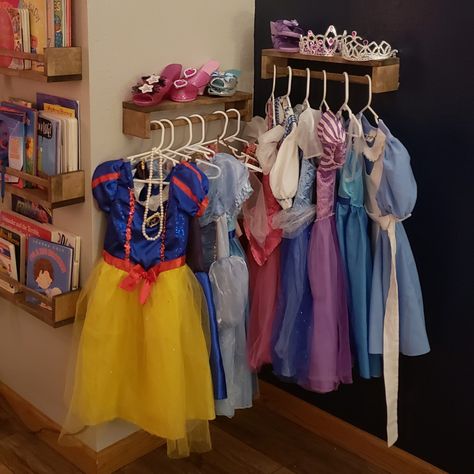 Ikea Spice Rack Dress Up, Dress Up Storage Behind Door, Dress Up Hanging Rack, Princess Dress Hanging Rack, Small Space Dress Up Storage, Dress Up Wall Ideas, Princess Dress Organization, Playroom Dress Up Area, Kids Dress Up Area