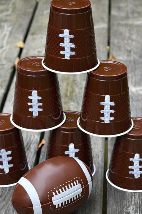 Football Knock Down: All you need's a white marker, toy football, and a few brown cups to bring this game to life. Click through to find more fun game ideas for your Super Bowl party. Football Themed Drinks, Dodgeball Tournament, Aba Activities, Football Party Games, Stitch 626, Superbowl Party Games, Football Watch Party, Football Banquet, Football Ideas