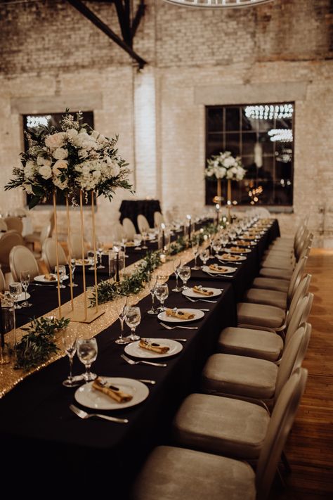 Gold sparkly table runner and black linen. Photo by www.alyssadphotography.com Black And Gold Long Table Decor, Black Table Cloth With Rose Gold Runner, Black Tablecloth Gold Runner, 30 Birthday Black And Gold, Black Gold Table Decorations, Table Decorations 21st Birthday, Black White And Gold Dinner Party, Black Table Cloth With Gold Runner, Gold And Black Table Decorations