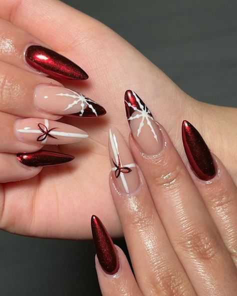 2. Metallic Red with Snowy Accents Red Winter Nails Square, Christmas Nail Almond Ideas, Medium Almond Nails Christmas, Nail Inspo Almond New Years, Nail Design Ideas Christmas, Christmas Nails￼, Nail Inspiration Holiday, Christmas Idea Nails, French Tip For Christmas