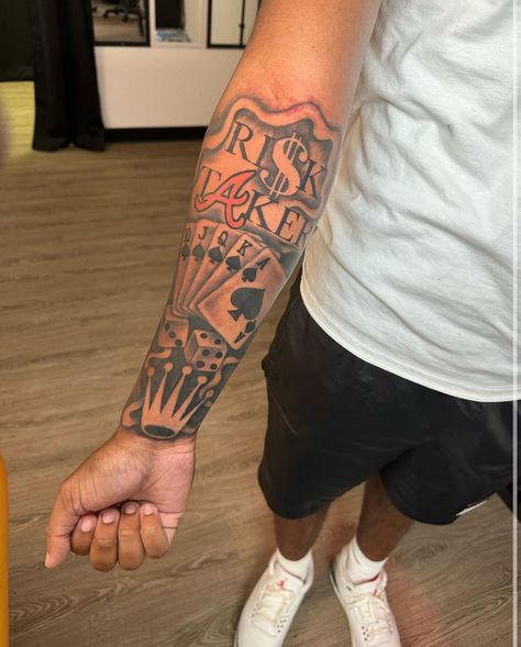 Red N Black Tattoo, 200 Dollar Tattoo Ideas, Men Medium Tattoo Ideas, Tattoos With Red Ink Men, Tattoos With Initials In Them, Elbow Tattoo Men Sleeve, Nlmb Gang Tattoo, Lifes A Gamble Tattoo Forearm, Atlanta Tattoo Ideas For Men