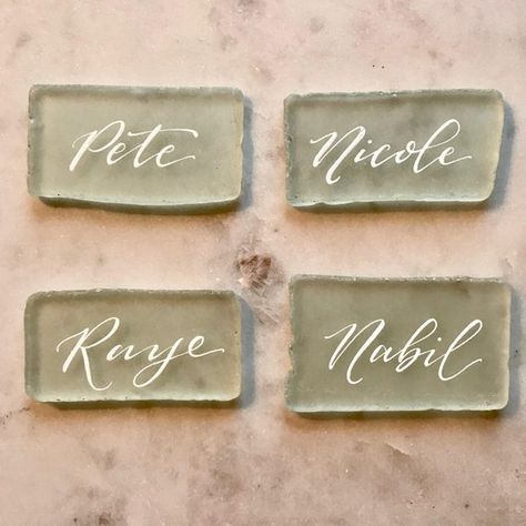 Sea glass place cards Wedding Beach Decor, Gandy Dancer, Coastal Wedding Decor, Sea Glass Wedding, Beach Wedding Tables, Place Cards Wedding, Wedding Name Cards, White Sea Glass, Glass Beach