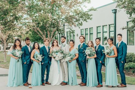 Teal Wedding Ideas Spring, Teal Blue Groom Suit, Teal Wedding Suit Groom, Teal Tuxedo For Men, Dark Teal Mens Wedding Attire, Navy Blue And Teal Wedding Theme, Teal Green Groomsmen Attire, Light Teal Wedding Colors, Teal Bridesmaid Dresses With Groomsmen