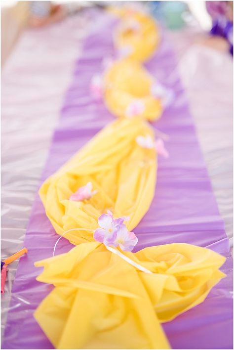 So, this post is a little late....and by a little late, I mean about five months late! Colbie's cute birthday party was back in April w... Tangled Birthday Party Centerpieces, Disney Princess Birthday Party Table Decor, Rapunzel Table Decor, Tangled Themed 2nd Birthday Party, Rapunzel Tangled Birthday Party, Princess Themed Centerpieces, Rapunzel Themed Centerpieces, Tangled Up In Two Birthday, Muted Disney Princess Party