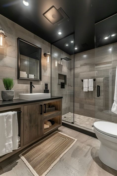 Check out tiny bathroom designs that offer smart and stylish solutions. These ideas are tailored for maximizing space without compromising on aesthetics. Stylish Shower Room, Dark Shower Bathroom Ideas, Modern Basement Bathroom Ideas, 2024 Bathroom Design, High Ceiling Bathroom Ideas, Smart Bathroom Design, Walk In Shower Ideas On A Budget, Little Bathroom Ideas Small Spaces, Second Bathroom Ideas