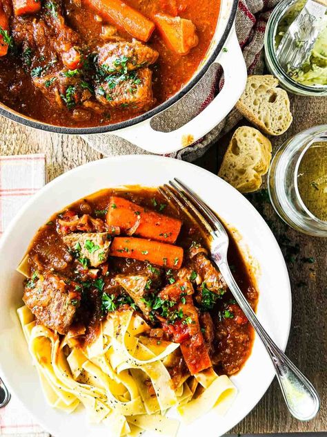 Patricia Wells' recipe for Beef Daube is a bright beef stew braised with white wine, onions, tomatoes, and herbs. Beef Daube, French Beef Stew, Easy Beef Stew Recipe, Canned Plums, The View From Great Island, Best Dutch Oven, Easy Beef Stew, Classic French Dishes, Irish Stew