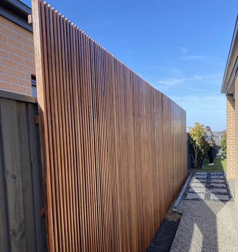 Screening Solutions on Instagram: “We supplied and installed our spotted gum vertical batten screens for this customer in officer. The screens were screwed onto the existing…” Patio Budget, Alfresco Ideas, Boundary Wall, Timber Slats, Hardwood Decking, Outdoor Screens, Timber Fencing, Wood Screens, Building A Fence