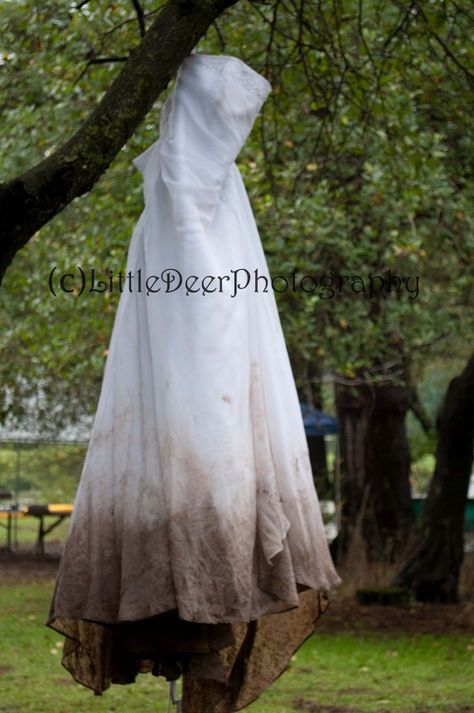 A beautiful bride's dress the morning after her unexpectedly rainy and muddy wedding. #divorce Muddy Wedding Dress, Destroyed Wedding Dress, Muddy Wedding, Divorce Photography, Hillbilly Wedding, Satanic Christmas, Divorce Photoshoot, Finally Divorced, Divorce Celebration