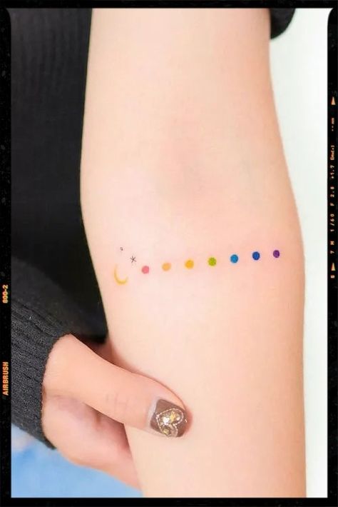 Moon and stars rainbow dot tattoo Pride Line Tattoo, Low Key Tattoos, Rainbow Bracelet Tattoo, Rainbow Dot Tattoo, Color Test Tattoo Ideas, Pride Ally Tattoo, Double Rainbow Tattoo, Color Test Tattoo, Dot Tattoos For Women