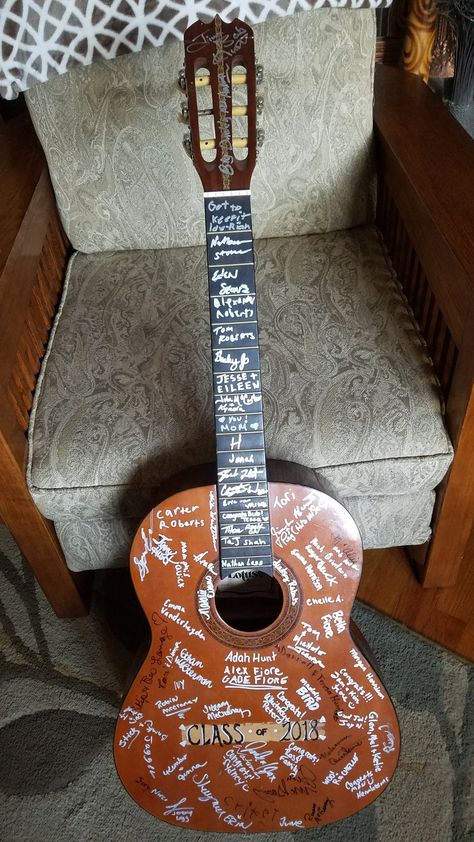 Music themed graduation party. Used old guitar as a guest book! Guitar Themed Birthday Party Decorations, Guitar Party Decorations Ideas, Music Party Aesthetic, Rock N Roll Graduation Party, Music Theme Table Decor, Guitar Graduation Party Ideas, Guitar Themed Party, Guitar Party Ideas, Music Graduation Party Ideas