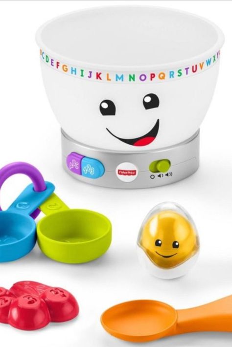 Light-up pretend mixing bowl with play ingredients for exciting baking play! Playful songs, sounds, and phrases introduce your baby to the alphabet, numbers, colors, and color mixing Put and take the ingredients in the bowl for exciting lights, music, and soundsComes with 6 removable play pieces, including rattle egg, milk bottle, set of 2 measuring cups, pretend cherries, BPA-free teethable chocolate bar, and spoon for “stirring” For babies ages 6-36 months; includes volume control switch Cool Toys For Boys, Baby Learning Toys, Fisher Price Baby, Baby Musical Toys, Learn Magic, Learning Toys For Toddlers, Pretend Food, Fisher Price Toys, Baby Music