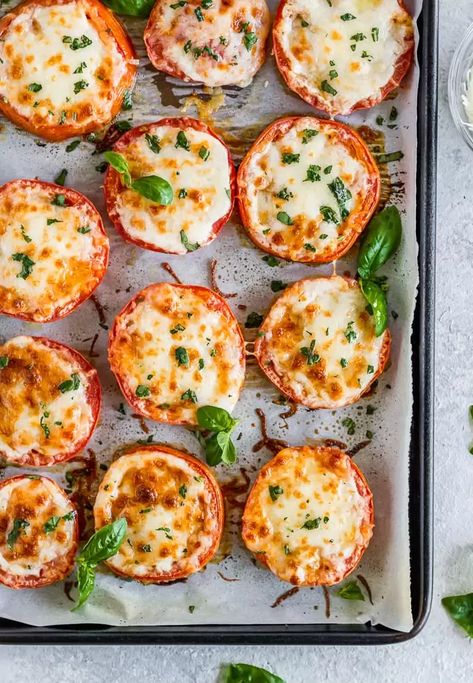 baked tomatoes with parmesan, mozzarella, and fresh basil Baked Tomatoes With Mozzarella, Tomatoes With Mozzarella, Baked Tomato Recipes, Parmesan Tomatoes, Baked Parmesan Tomatoes, Tomato Recipe, Oven Roasted Tomatoes, Tomato Dishes, Stuffed Tomatoes