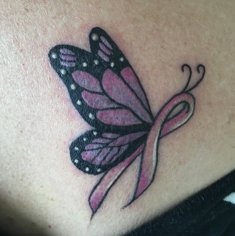 Ribbon Name Tattoo, Purple Ribbon Butterfly Tattoo, Butterfly With Ribbon Tattoo, Butterfly Ribbon Tattoo Design, Butterfly Tattoo With Ribbon, Pink Ribbon Butterfly Tattoo, Ribbon Butterfly Tattoo, Infinity Butterfly Tattoo For Women, Fibro Tattoo