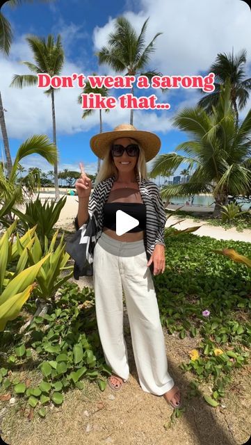 Monica D 🌺 Hawaii 🏖 Beach on Instagram: "I bet you didn’t think of that!
*
Here’s an easy fashion hack to make a blouse from a sarong / pareo !
*
Very handy when you are traveling only with your carry on , all you need is a sarong or oversized scarf and first you can use it as a cover up for the beach and after the beach you can easily transform it into a blouse! All you need is a hair tie! Wear it with some linen pants and you are ready for any occasion!
*
Fold your sarong in half. Gather the fabric together so it looks like a pretty flower, use a hair tie to tie it together . Place the flower on top of your shoulder, drape one end in front of you and the other end on your back . Grab the end on the back , bring them to the front and tie them together. My scarf is pretty big so i decide Sarong Tying, Beach Ware, Easy Fashion, Swimming Outfit, Oversized Scarf, Pretty Flower, Scarf Tying, Beach Tops, Sarong