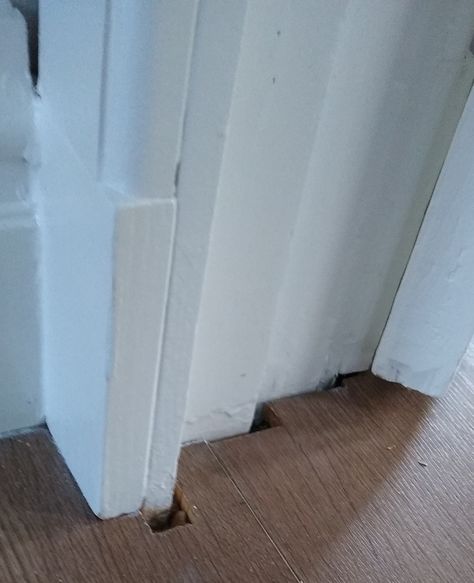 How should I conceal gaps between laminate flooring and wall trim? - Home Improvement Stack Exchange How To Repair Laminate Flooring, How To Fix Gaps In Laminate Flooring, Floor Trim Ideas, Feminine Farmhouse, Laminate Flooring On Walls, Flooring On Walls, Garland Hanger, Best Vinyl Flooring, Installing Laminate Flooring