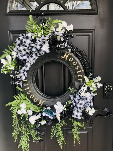 Racing Hoosier tire wreath Nascar Wreath Ideas, Race Car Door Hanger, Racing Decorations House, Racing Wreath Ideas, Race Car Wreath, Car Show Craft Ideas, Racing Door Hanger, Indy 500 Decorations, Tire Shop Decor Ideas