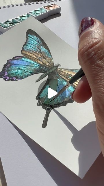 Metallic&shiny watercolor artist on Instagram: "✨Beauty of butterflies 🦋 ✨Wishing you a great weekend y’all 💆🏻‍♀️✨ . Using ghost pearls & sapphire shifters from @skrim_watercolors . 100% cotton hot pressed paper @fabriano1264 . . . . . #butterfly #beauty #butterflylove #butterflys #butterflytattoo #butterflyart #watercolortattoo #artlover #watercolortutorial #watercolortattoo #butterfly #butterflydrawing #watercolorart #art #aquarelle #drawing #illustration #illustrationartists #zarinartist" Finetec Watercolor, Aquarelle Drawing, Butterfly Art Painting, Pressed Paper, Watercolor Paint Set, Watercolor Projects, Glitter Art, Butterfly Drawing, Watercolor Painting Techniques