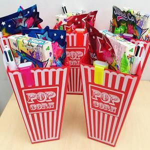 Top Movie Night Party Favors Kids Will Love Movie Birthday Party Favors, Kids Movie Party, Treat Bag Ideas, Movie Night Party Favors, Goody Bag Ideas, Birthday Movie Night, Diy Movie Night, Popcorn Theme, Movie Theme Birthday Party