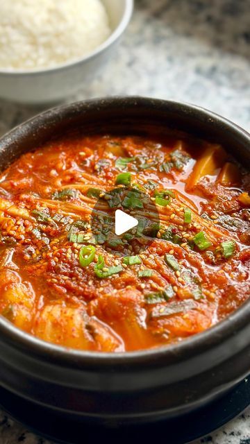 Ramya | vegan recipes ✨ on Instagram: "20 DAYS OF 20-MINUTE QUICK MEALS EP 3: SUNDUBU JJIGAE WITH KIMCHI❤️‍🔥 Did you know this Korean Soft Tofu Stew (also known as Sundubu Jjigae) is only made in one-pot and is super duper beginner friendly? In general, Kimchi stews came about when the kimchi variant made with chili peppers grew popular in the peninsula mid-era. This stew is easy and delicious! Full recipe here: https://browngirlveganeats.com/vegan-sundubu-jjigae-korean-soft-tofu-stew/ #vegan #veganuary #veganrecipes #veganfood #tofurecipes #plantbased #vegansofig #vegansofinsta #veganshare #veganfoodshare #sundubujjigae #softtofustew #kimchistew #quickrecipes #koreanrecipes #koreanstew" Kimchi Jigae Recipe Vegetarian, Tofu Stew Korean, Kimchi Jigae Recipe, Sundubu Jjigae, Soft Tofu Stew, Soondubu Jjigae, Tofu Stew, Stew Vegan, Soft Tofu