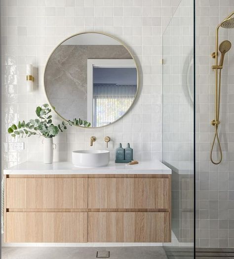 INTERIOR DESIGN | STYLING & DECORATING on Instagram: "✨Introducing the guest en-suite at our Somerton Park Project ✨

We wanted to create a space that was both understated and yet had a subtle wow factor. Our goal was to design a guest bathroom that would feel welcoming and luxurious, but also timeless. I think we nailed it 😉

To achieve this, we focused on selecting classic finishes and fixtures that would stand the test of time. We chose a neutral color palette of warm grays and whites, which creates a calming and peaceful atmosphere. 

The feature tile is the Zellige Ceramic Gesso and the floor tile is Anzo Moon Matt both from @ceramicatiledesign 🙌🏼

The custom-built vanity features clean lines and a timeless design. We paired it with a stunning marble countertop, one feature wall li Timeless Ensuite Bathroom Ideas, Feature Wall Ideas Bathroom, Bathroom Feature Tile, Bathroom Neutral Colors, Bathroom Furniture Ideas, Marble Bathroom Ideas, Bathroom Feature Wall Tile, White Marble Tile Bathroom, Modern Bathroom Furniture