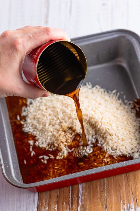 pouring beef broth into baking dish. Rice Recipes With Beef Broth, Beef Broth Rice Recipes, Beef Broth Rice, Rice With Beef Broth, Stew Beef And Rice, Butter Rice Recipe, Dirty Rice Recipe Easy, Sides Dinner, Buttered Rice Recipe