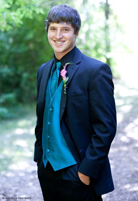 Classic tux with a dark teal vest and tie Black And Teal Suit Men, Teal Suit Men, Black Hills Wedding, Teal Vest, Wedding Tips And Tricks, Mens Navy Suit, Teal Suit, Masquerade Prom, Grooms Men