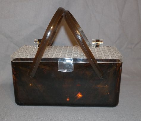 Vintage 1960s acrylic box purse in a gorgeous marbled tortoise shell and daisy button translucent lid. Very nice condition overall. there are a few scuffs, but no cracks or breaks found. The latch is not super tight, but then, I have never known one of this type to be very tight. Box Purse, Makeup Store, Shell Pattern, Top Handbags, Beautiful Handbags, Vintage Purses, Acrylic Plastic, Vintage Lucite, Acrylic Box